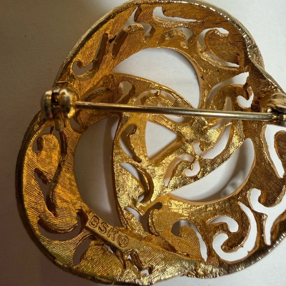 Vintage BSK Gold Tone Openwork Swirl Circle Brooch Pin